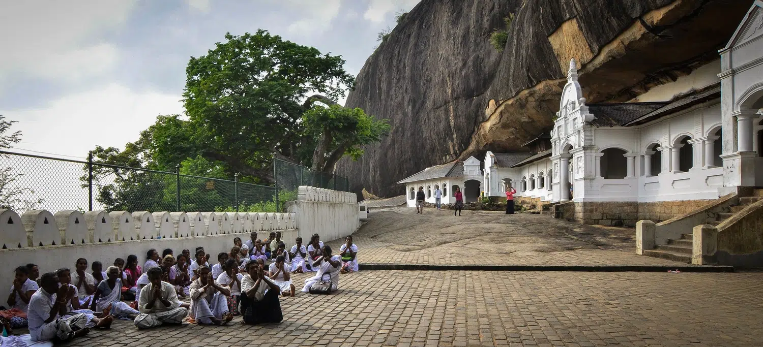 Dambulla Cave Temple Buddha statues and cave shrine for Sri Lanka private day tour with Trustker